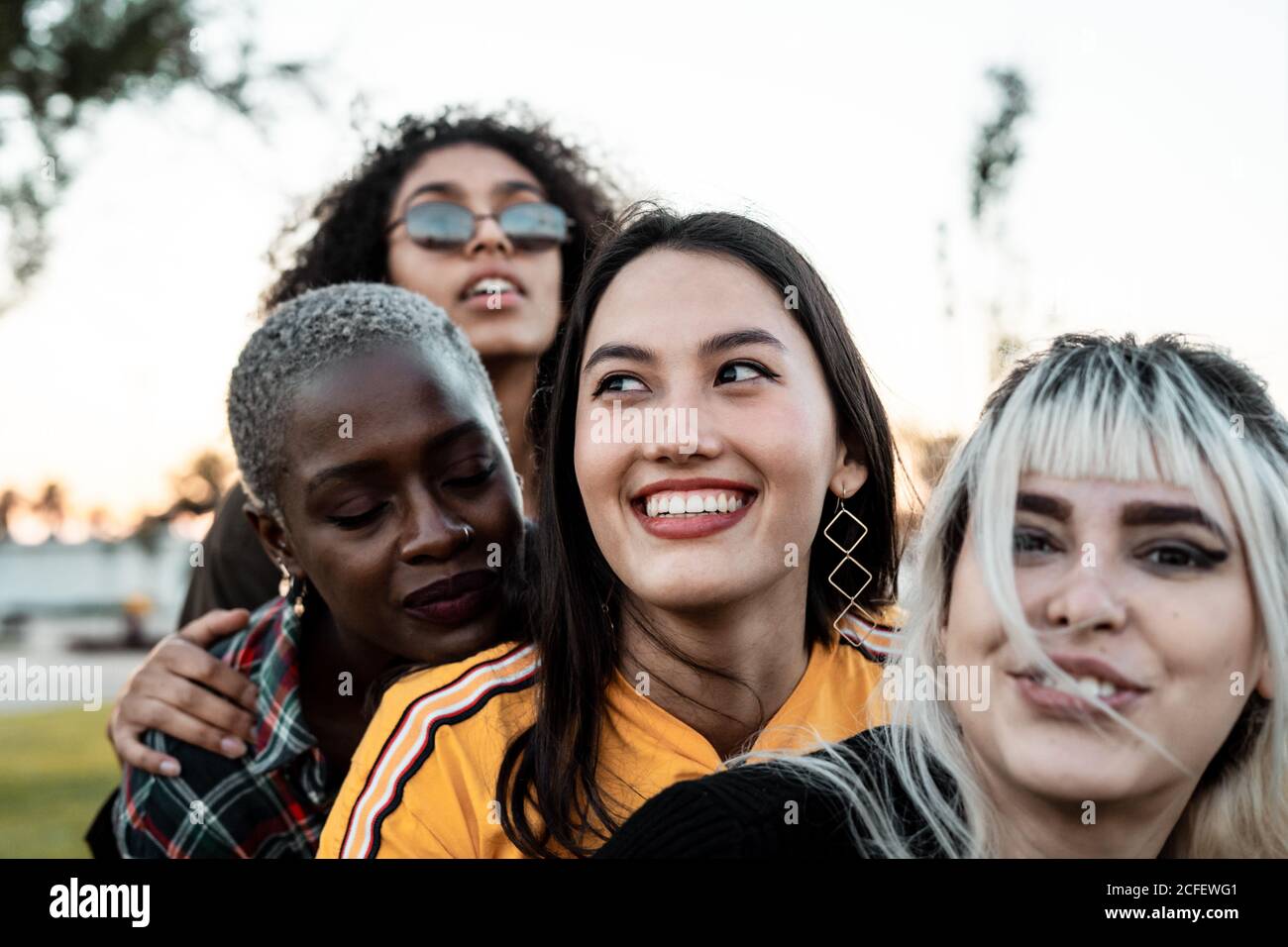Group of women hugging hi-res stock photography and images - Alamy