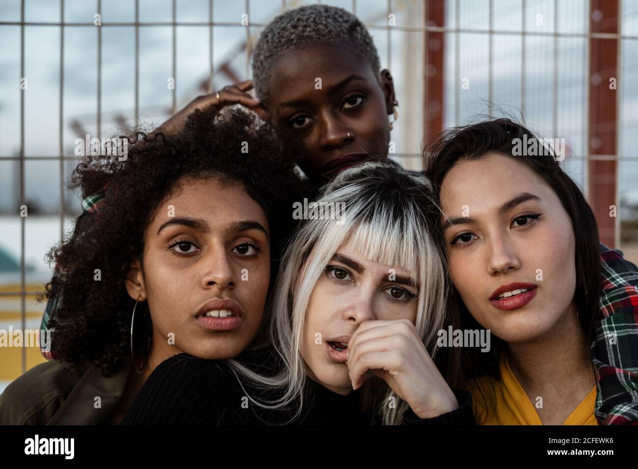 Group of women hugging hi-res stock photography and images - Alamy