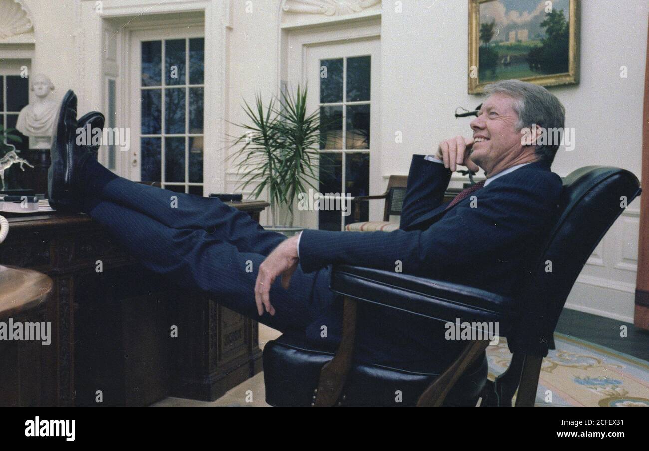 Jimmy Carter sitting in the Oval Office ca. 18 April 1978 Stock Photo