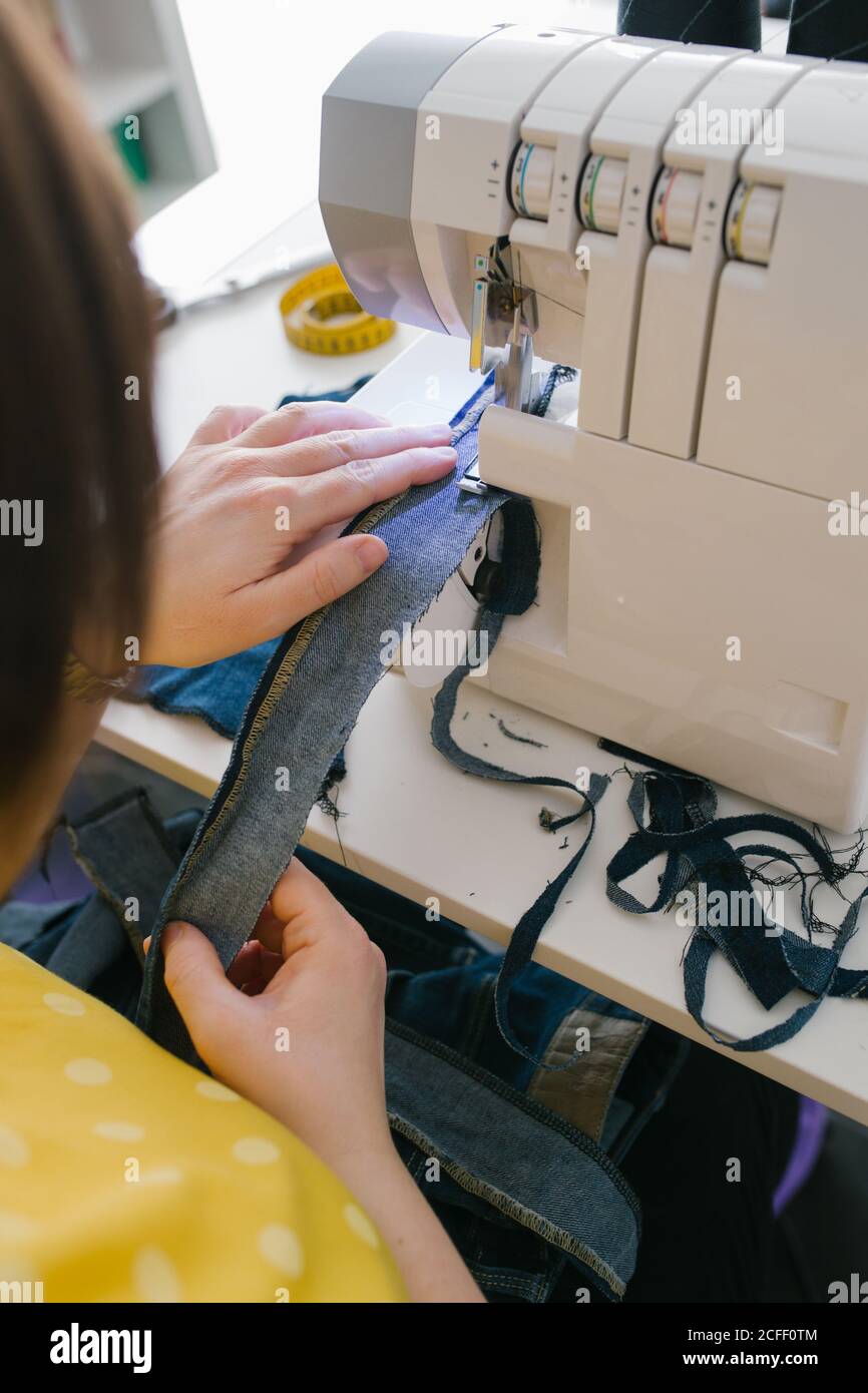 Anonymous seamstress using sewing machine hi-res stock photography and ...