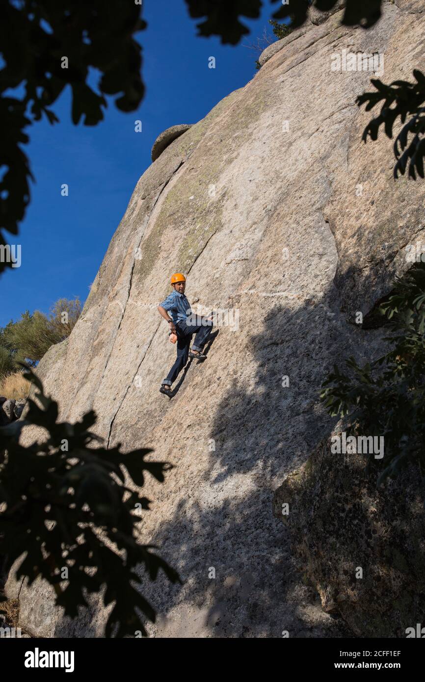 From below of free climber climbing in nature Stock Photo Alamy