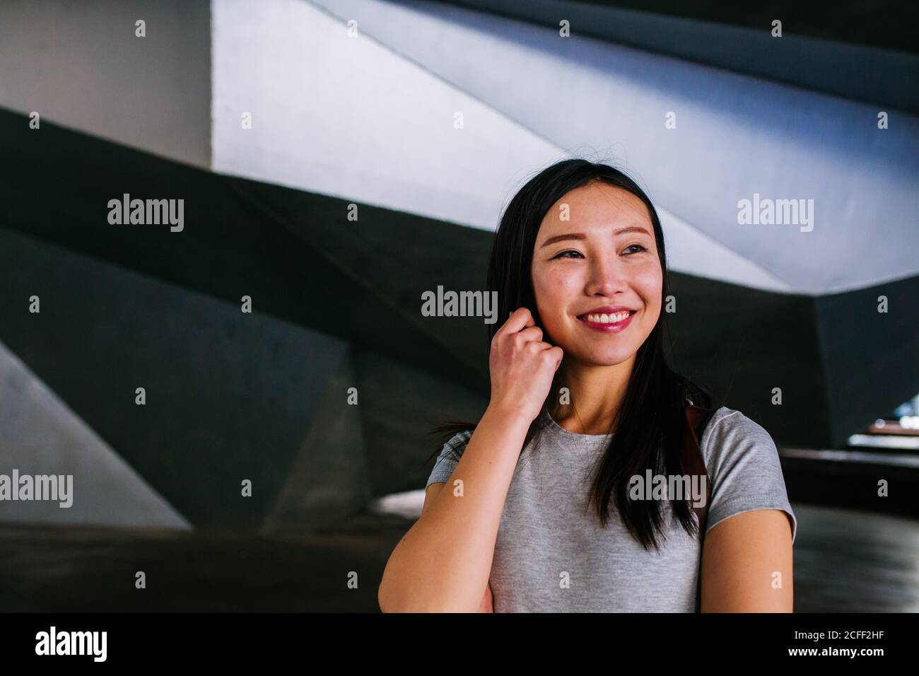 Glad excited young asian hi-res stock photography and images - Alamy