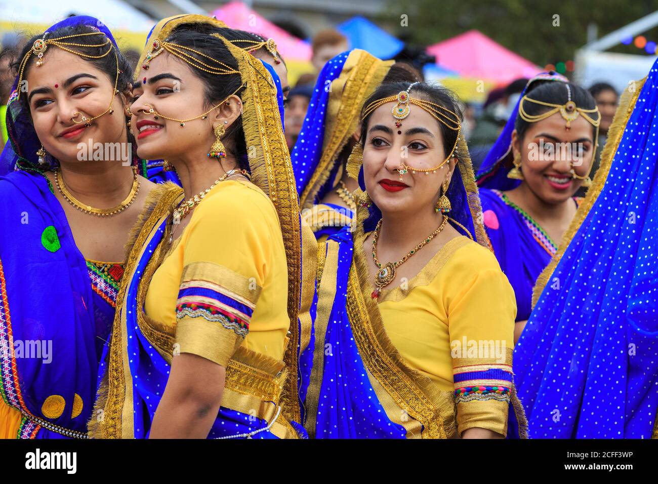 Performers in colourful Indian  and Rajastani dresses  at Diwali on the Square, Diwali Festival Trafalgar Square, London Stock Photo