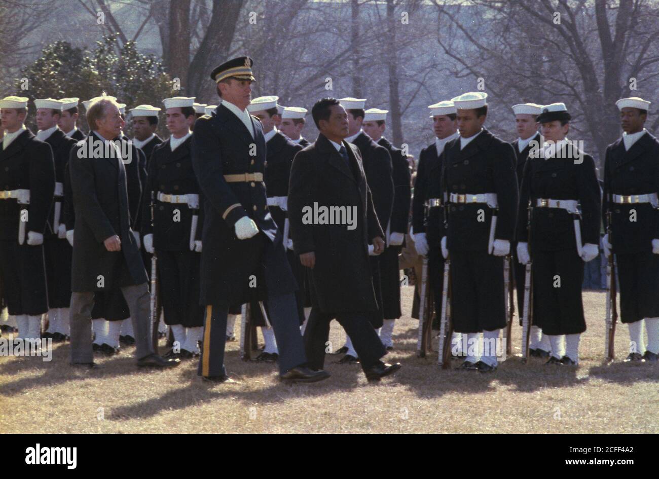 Kriangsak Chomanan and Jimmy Carter review the troops during arrival
