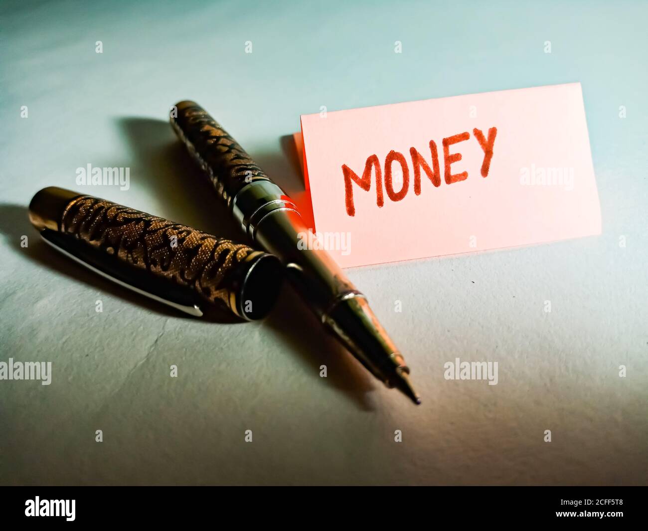 Money word displayed on paper slip concept for educational informative awareness. Stock Photo