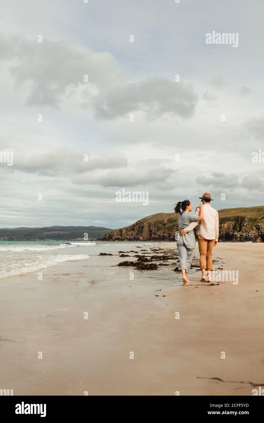 Happy couple having fun on Scottish coast Stock Photo