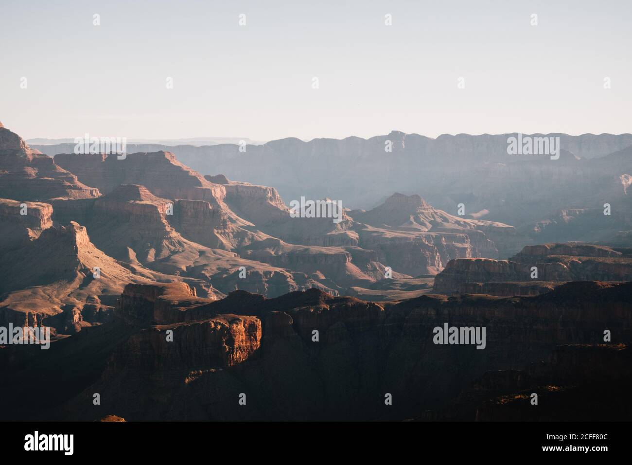 View of big canyon with rocks and mountains at sunrise in USA Stock Photo