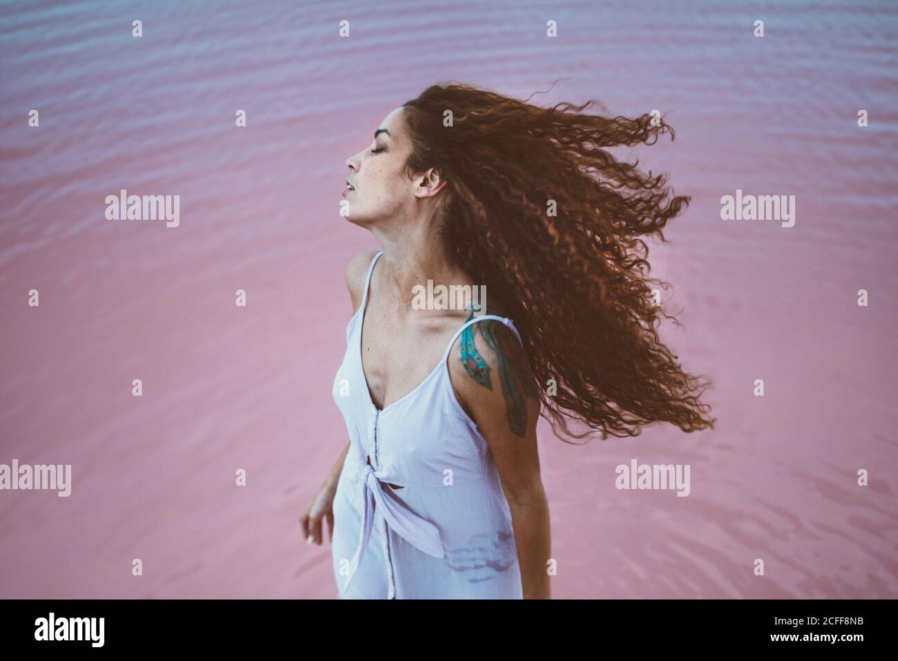 Long curly hair hi-res stock photography and images - Alamy