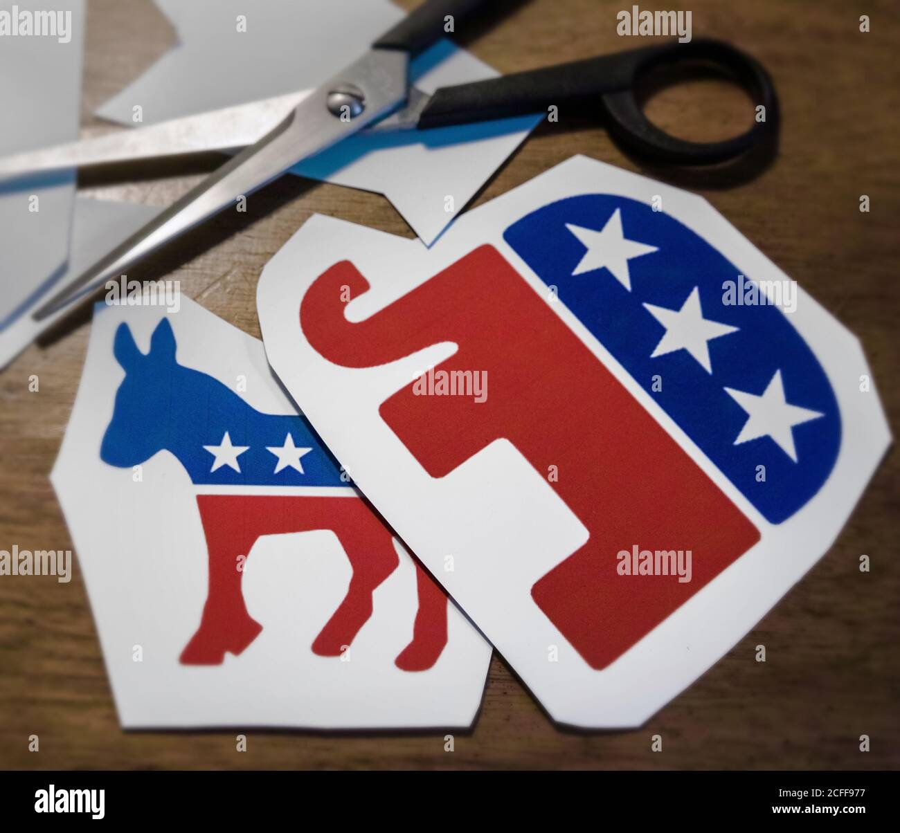 On the work table someone makes a daring montage of the two most important American political symbols. Advantage Republican Party. Stock Photo