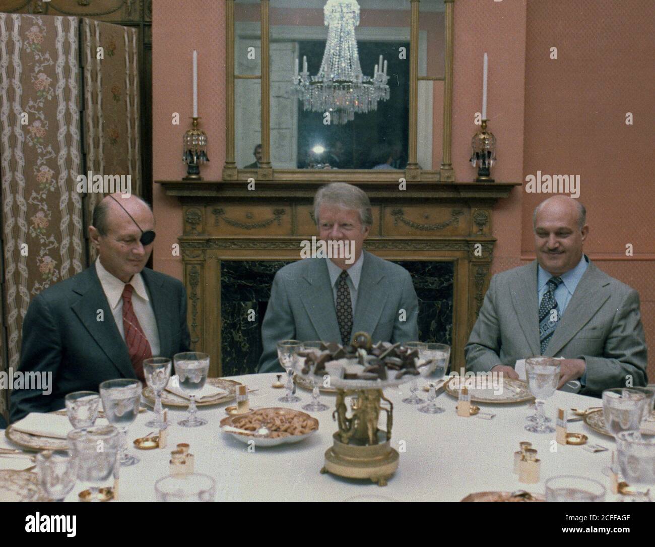 Jimmy Carter hosts a luncheon at Blair House for Israeli and Egyptian negotiator Moshe Dayan and Hassan Ali. ca.  19 October 1978 Stock Photo