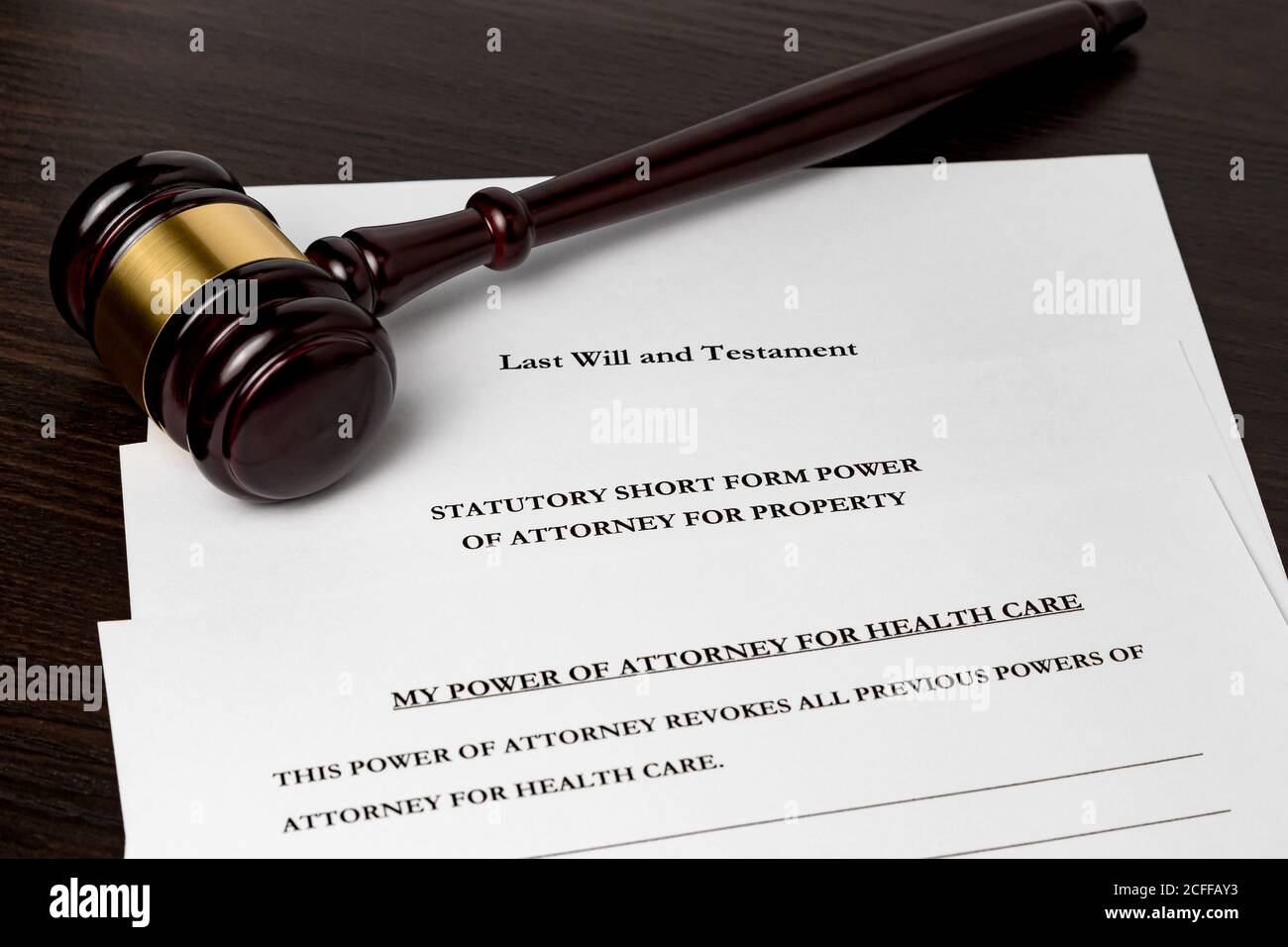 Last will and testament, Power of Attorney, and health care power of attorney forms with gavel. Concept of planning for death and estate planning Stock Photo