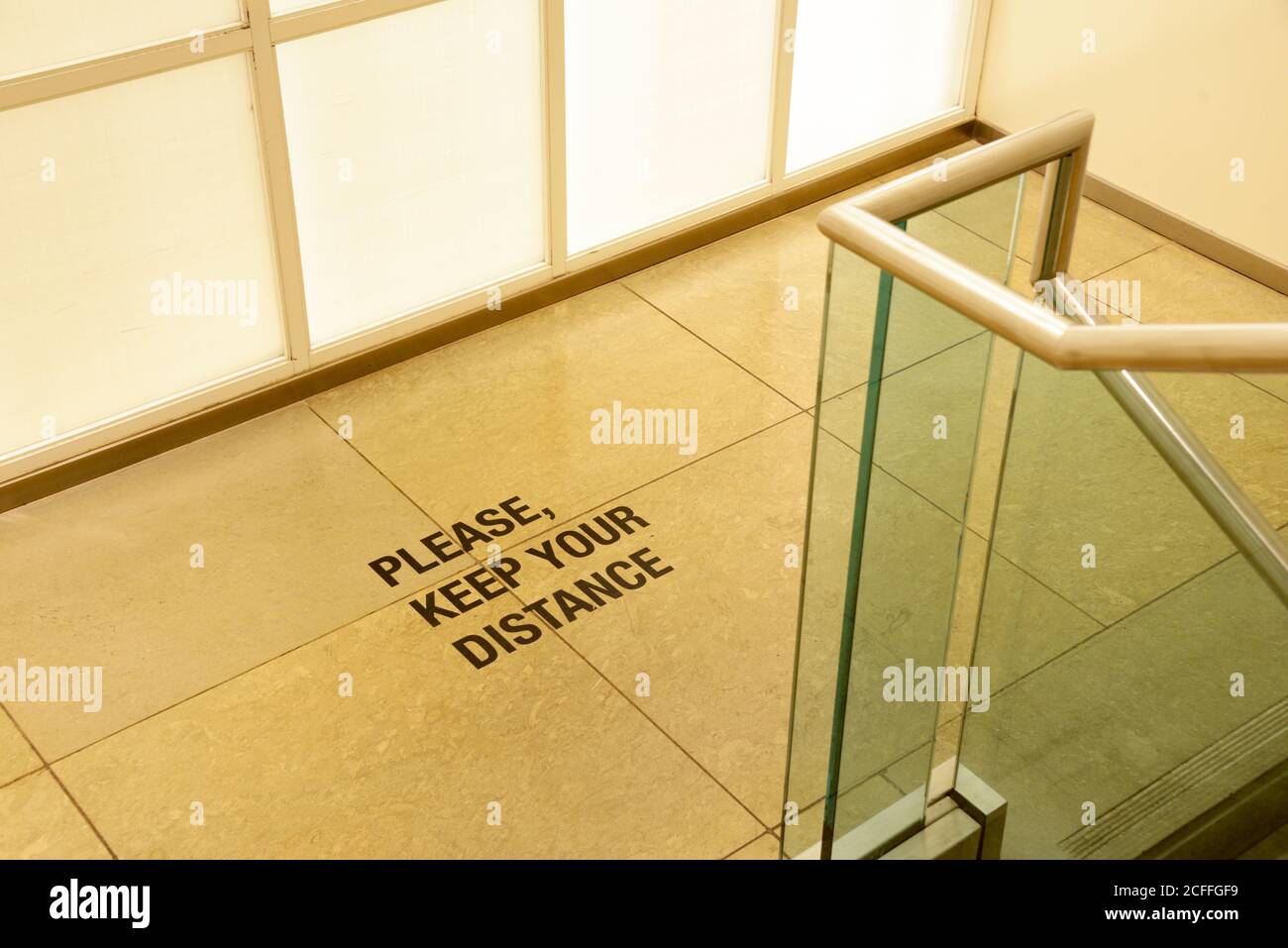 Please Keep Your Distance, markings on stairs Stock Photo