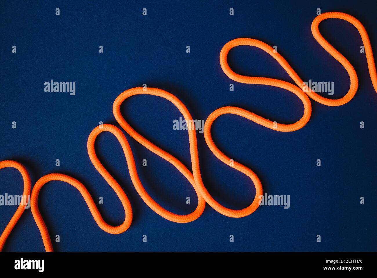 From above of arrange orange shoelaces 