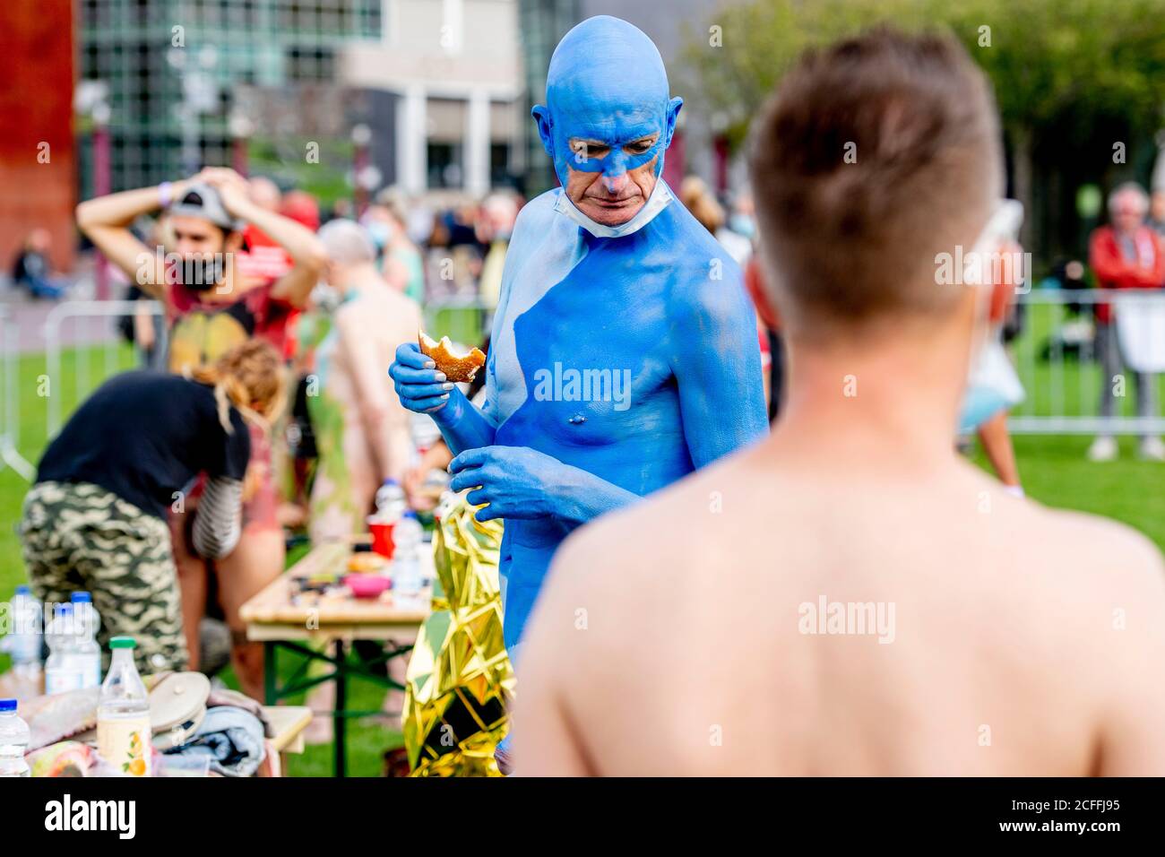 Amsterdam, Netherlands. 05th Sep, 2020. A model is seen covered in blue painting during the Amsterdam Bodypaint Art Event.The Amsterdam Body Art Foundation is organizing the Amsterdam Bodypaint Art Event on the Museumplein for the fourth time on September 5, 2020. Several artists paint the various bodies of models to create a beautiful work of art. The theme this year is “Climate Awareness” thus the encouragement to artists to incorporate plants and animals in their artwork not leaving out the the elements in their creations. Credit: SOPA Images Limited/Alamy Live News Stock Photo