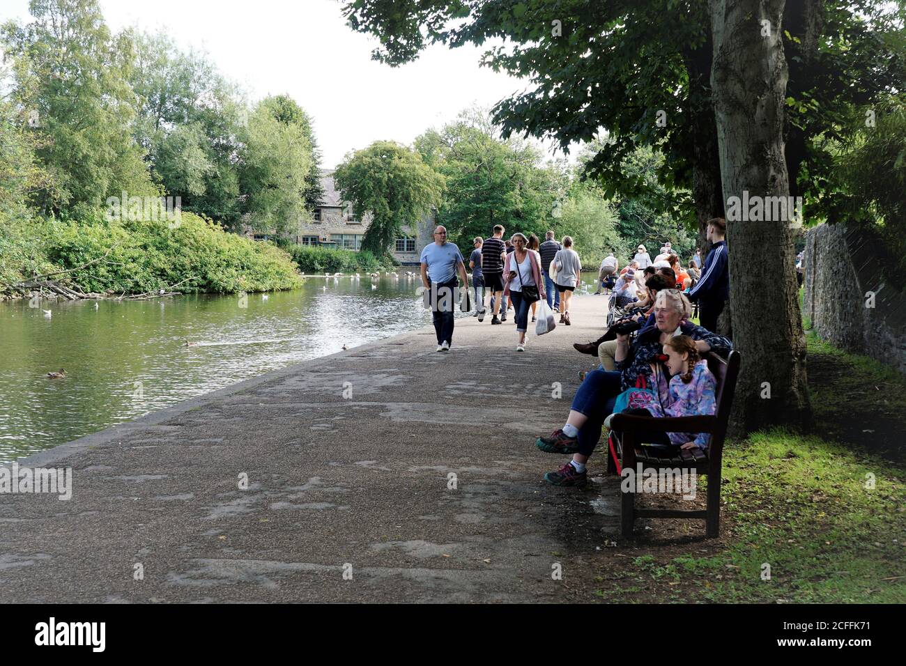 Bakewell, Derbyshire, UK.  August 24, 2020. Families of tourists and locals enjoying the nature on the river Wye at Bakewell in Derbyshire, UK. Stock Photo