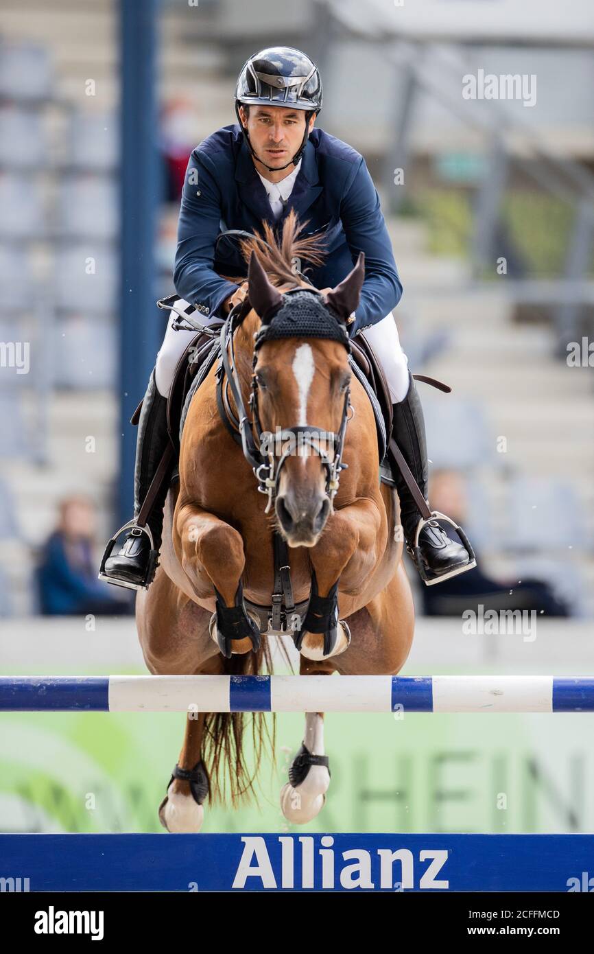 05 September 2020 North Rhine Westphalia Aachen Steve Guerdat A Show Jumper From Switzerland Jumps Over An Obstacle On His Horse Bandit Savoie During The Stawag Prize At The International Jumping Competition Aachen Photo