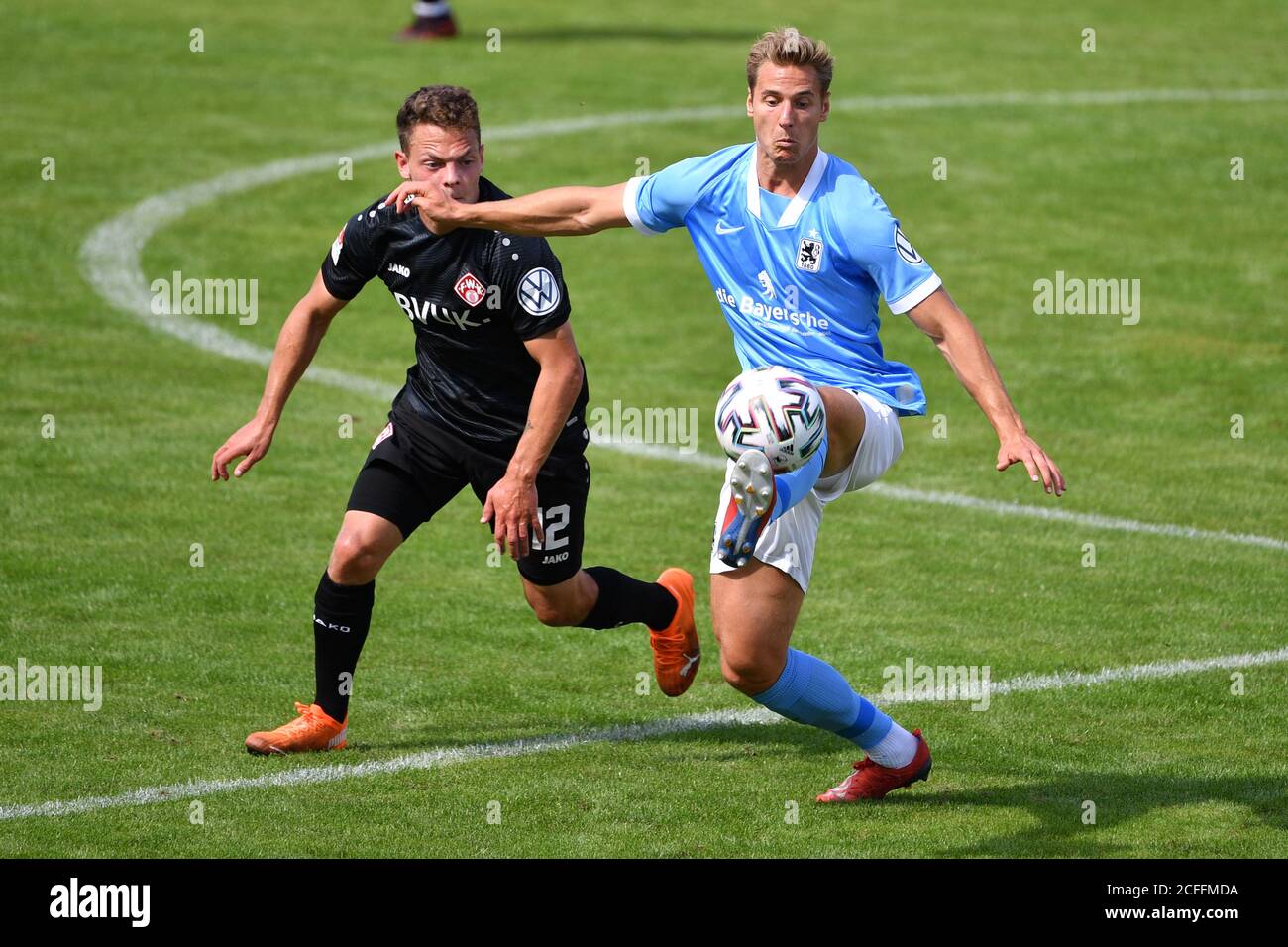 Muenchen GRUENWALDER STADION. 10th Apr, 2021. Mael CORBOZ (Verl), action,  duels versus Dennis DRESSEL (TSV Munich 1860). Soccer 3rd league, Liga3, TSV  Munich 1860 - SC Verl 3-2, on April 10th, 2021