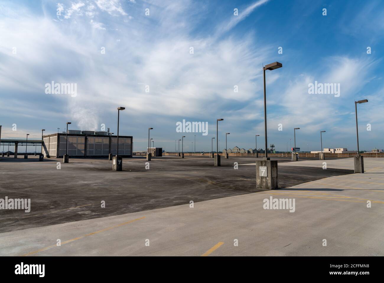 Empty parking lot blue skies hi-res stock photography and images - Alamy