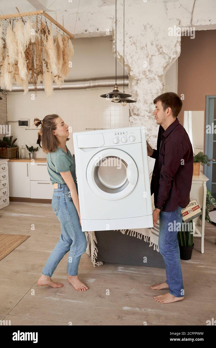 Appliance delivery. Hand truck, fridge, washing machine and micr Stock  Photo by ©maxxyustas 48373713