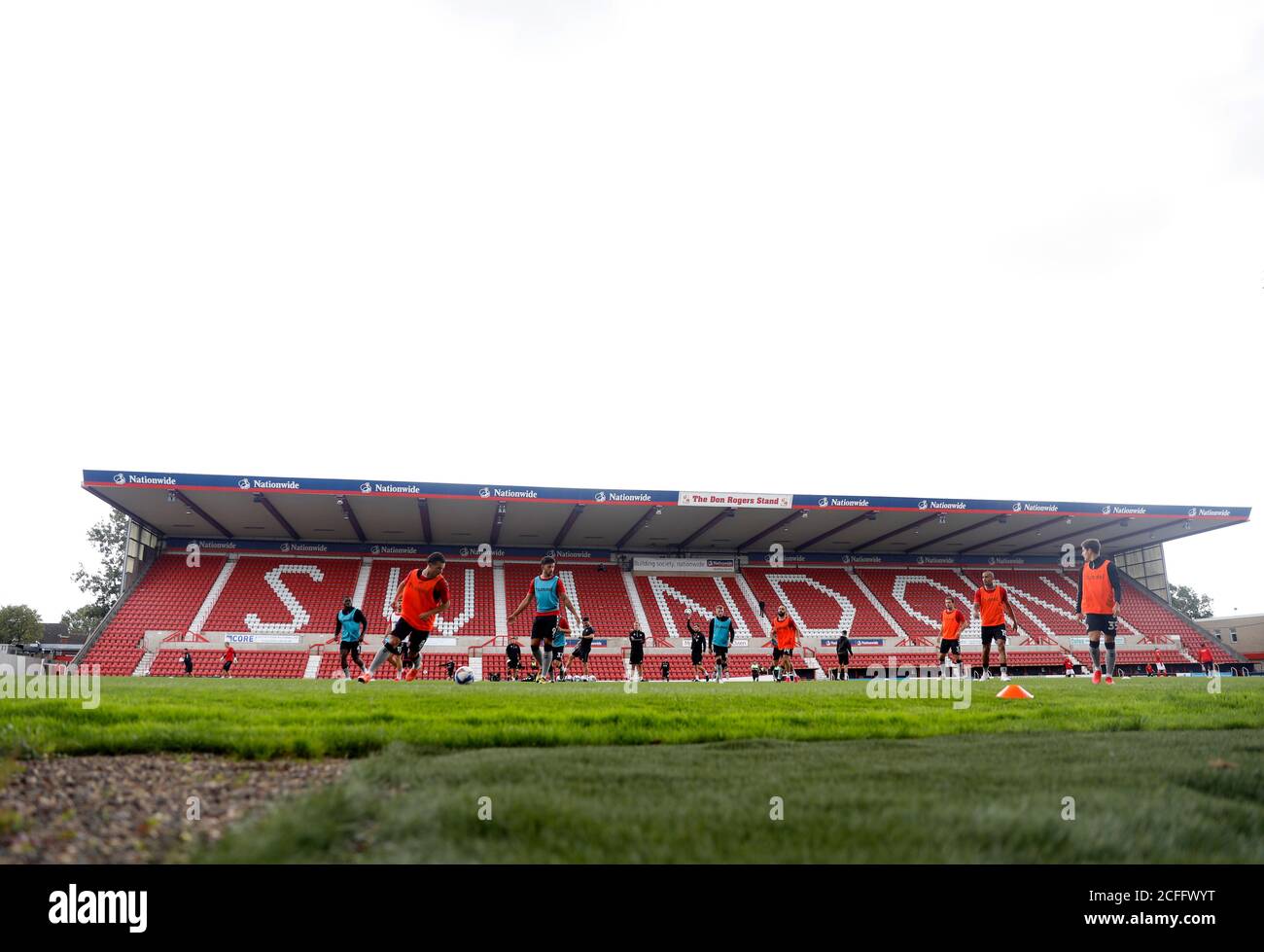 Charlton Athletic players warm up before the Carabao Cup first round match at the County Ground, Swindon. Stock Photo