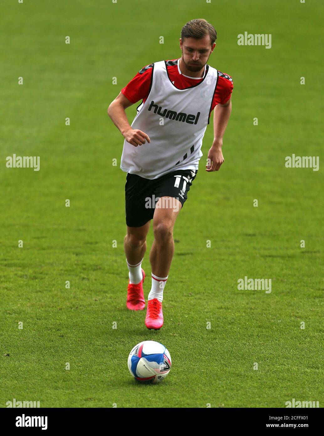 Charlton Athletic's Alex Gilbey warms up before the Carabao Cup first round match at the County Ground, Swindon. Stock Photo