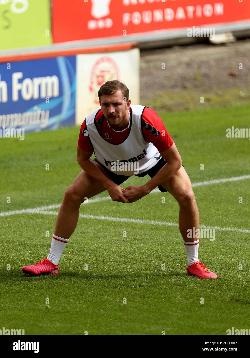 Charlton Athletic's Alex Gilbey warms up before the Carabao Cup first round match at the County Ground, Swindon. Stock Photo