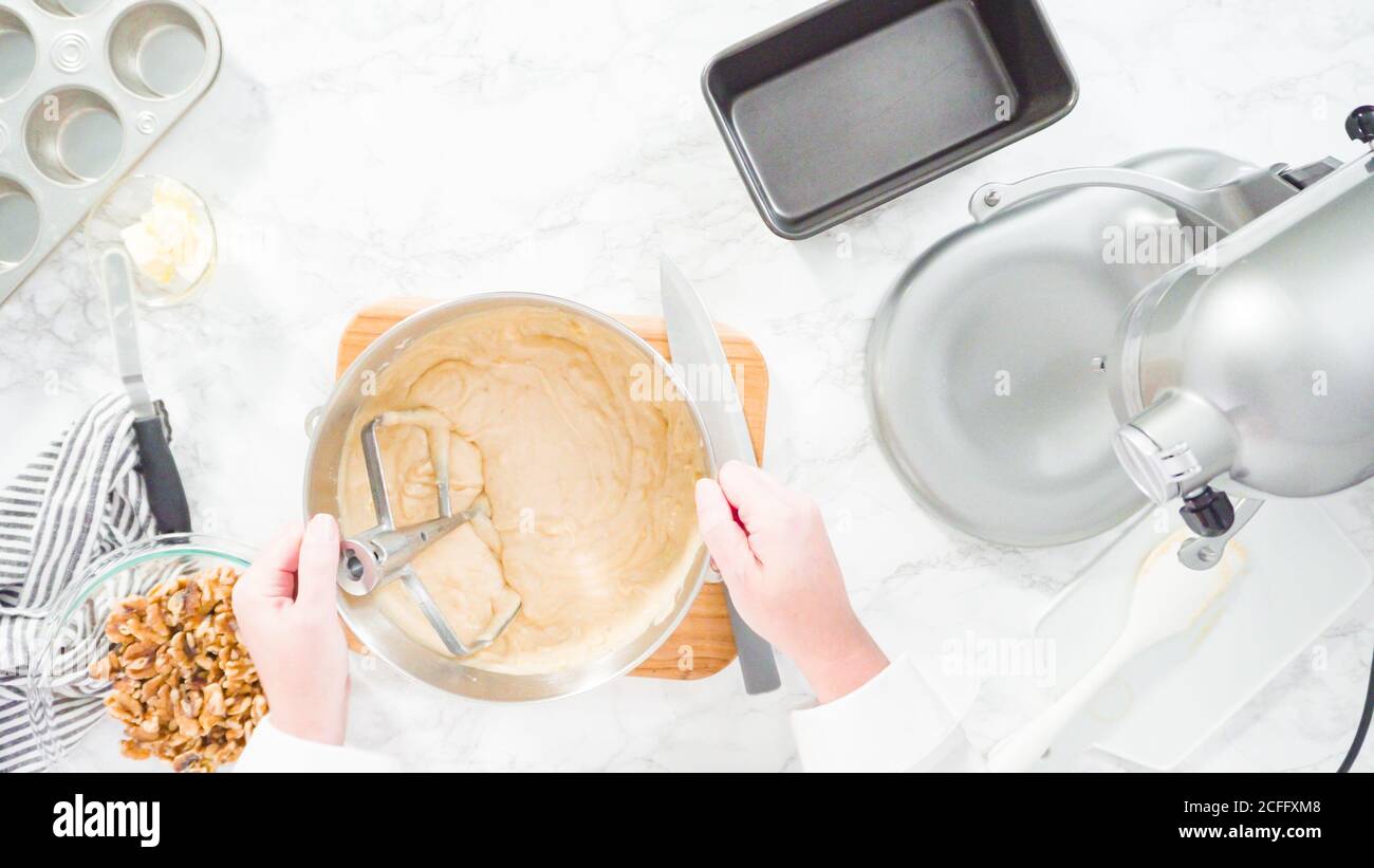 flat-lay-step-by-step-mixing-ingredients-together-into-a-metal-mixing