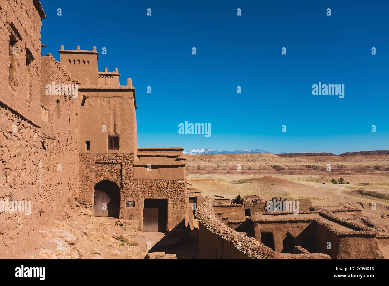 Magnificent scenery of facade of ancient clay buildings and walls in Ait Ben Haddou on sunny day Stock Photo