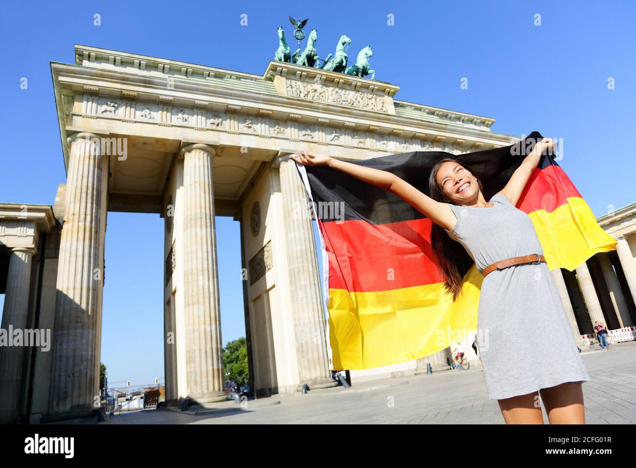 German flag woman joy at Berlin Brandenburger Tor Stock Photo - Alamy