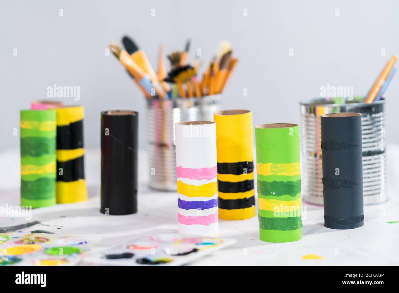 Making different bugs out of empty toilet paper rolls during ...