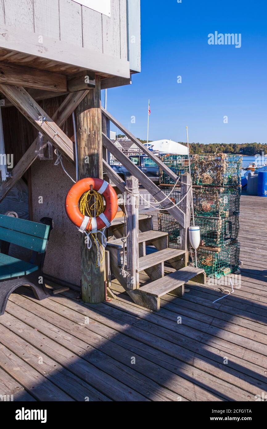 Freeport Town Wharf area at South Freeport harbor, South Freeport, Maine. Fishing boats and fishing gear abound in this quintessential Maine wharf. Stock Photo