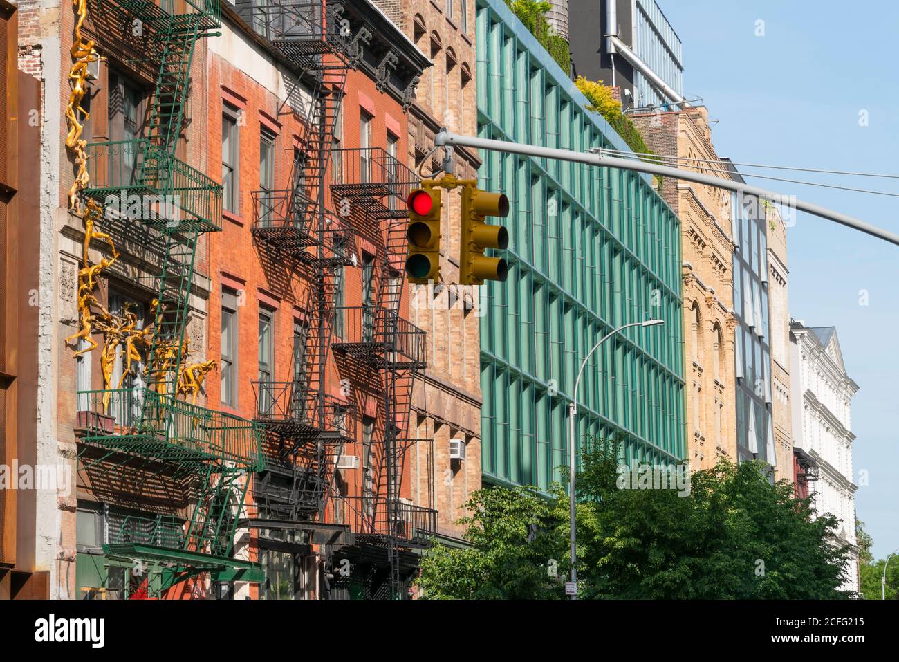 Loft apartments buildings stand on the Bond Street in NOHO New York