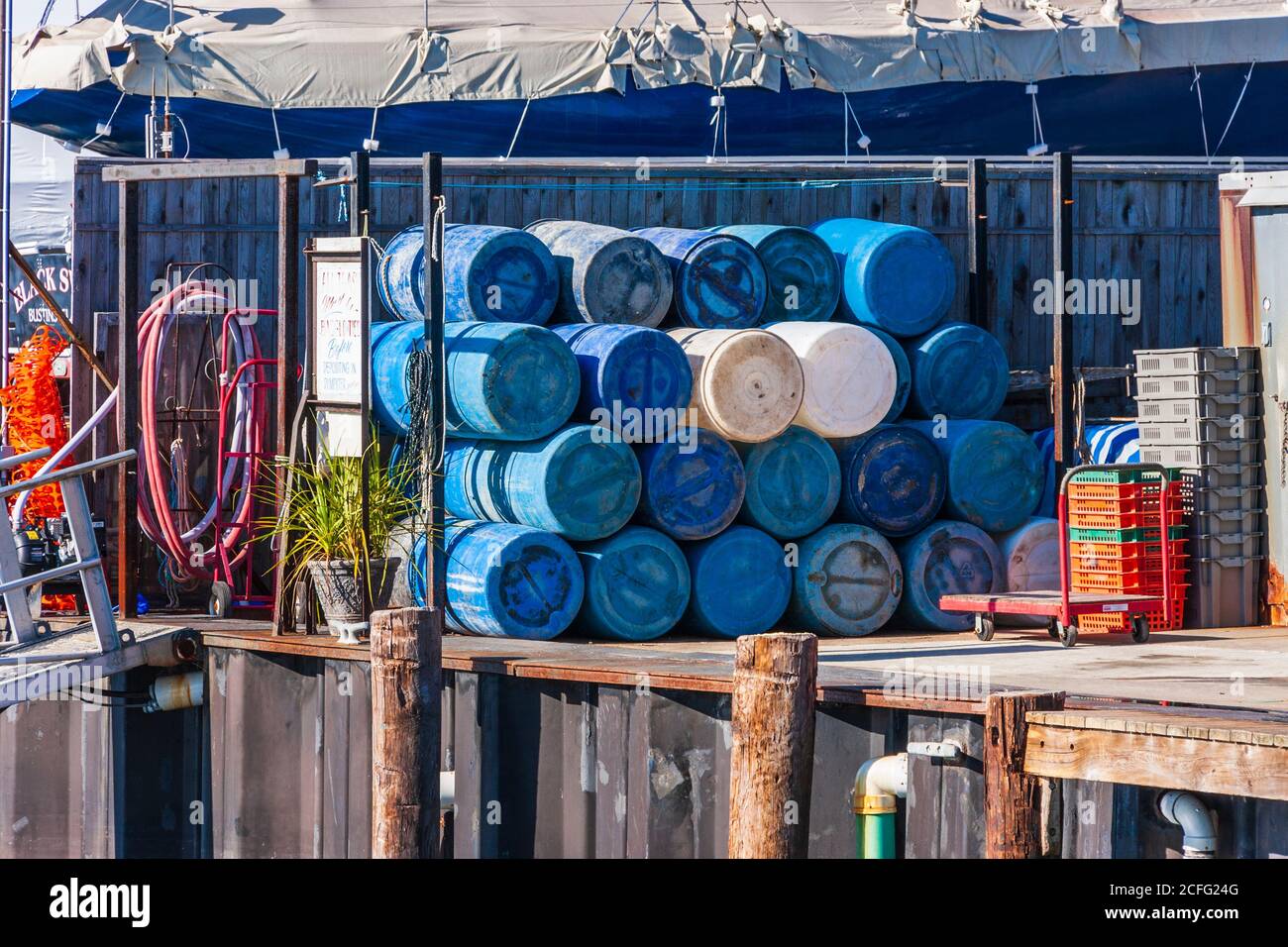 Freeport Town Wharf area at South Freeport harbor, South Freeport, Maine. Fishing boats and fishing gear abound in this quintessential Maine wharf. Stock Photo