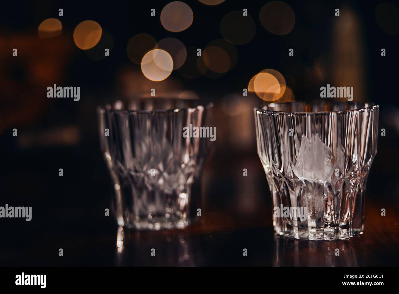 The crystal drinking glasses on the night light Stock Photo