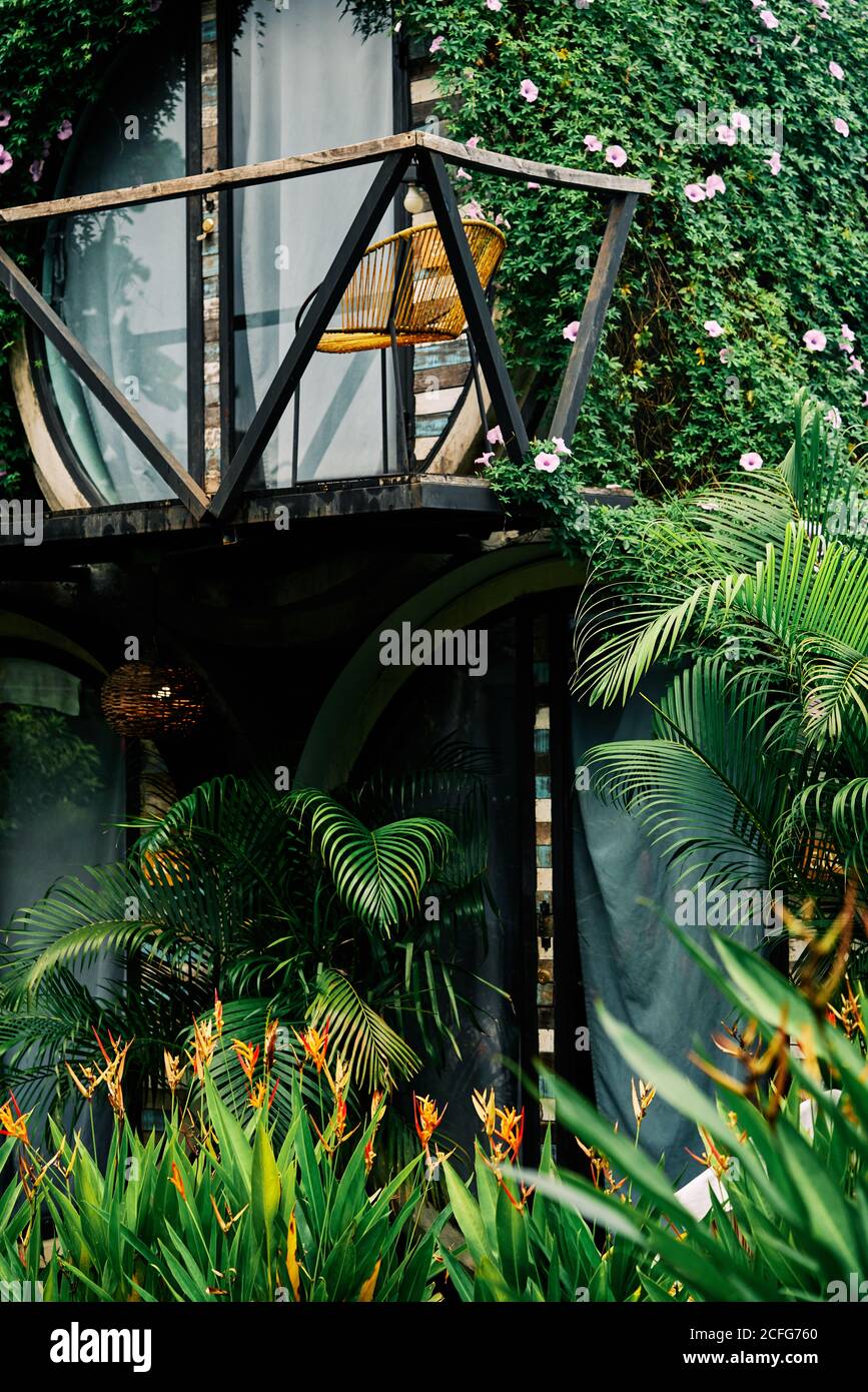Contemporary comfortable bungalow in green garden in tropical resort in Costa Rica Stock Photo