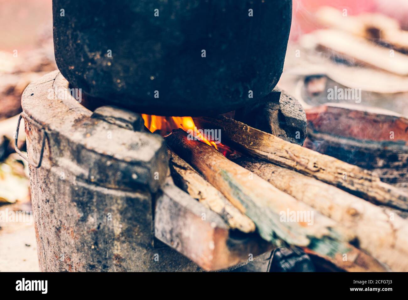 Thai style to make soft-boiled rice Charcoal to cook. Stock Photo