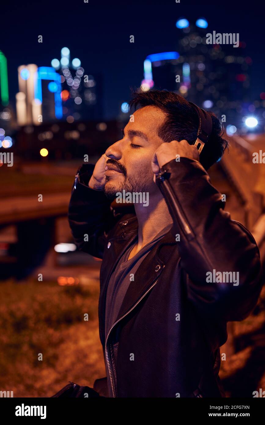 Guy in leather jacket using hi-res stock photography and images - Alamy