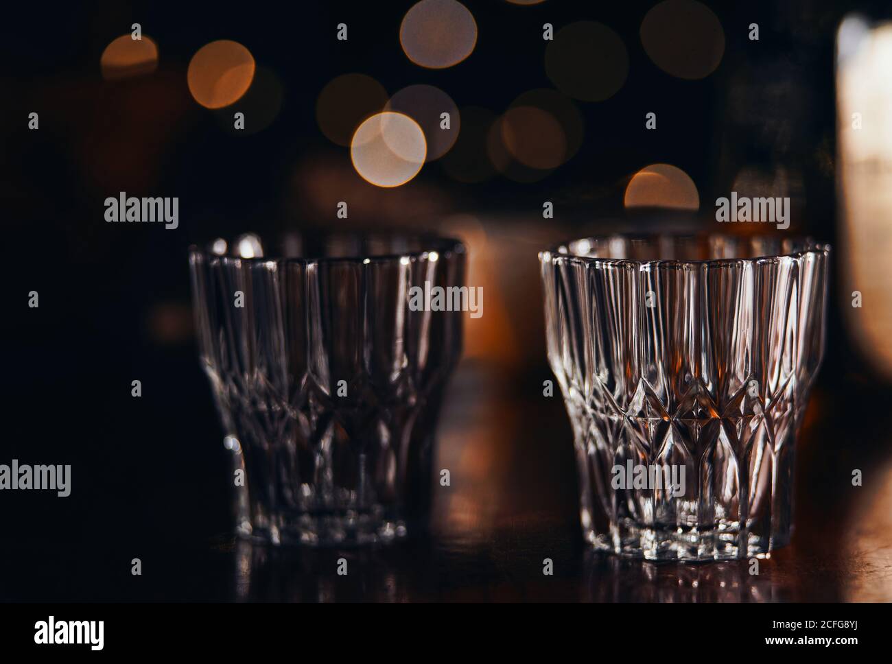 The crystal drinking glasses on the night light Stock Photo