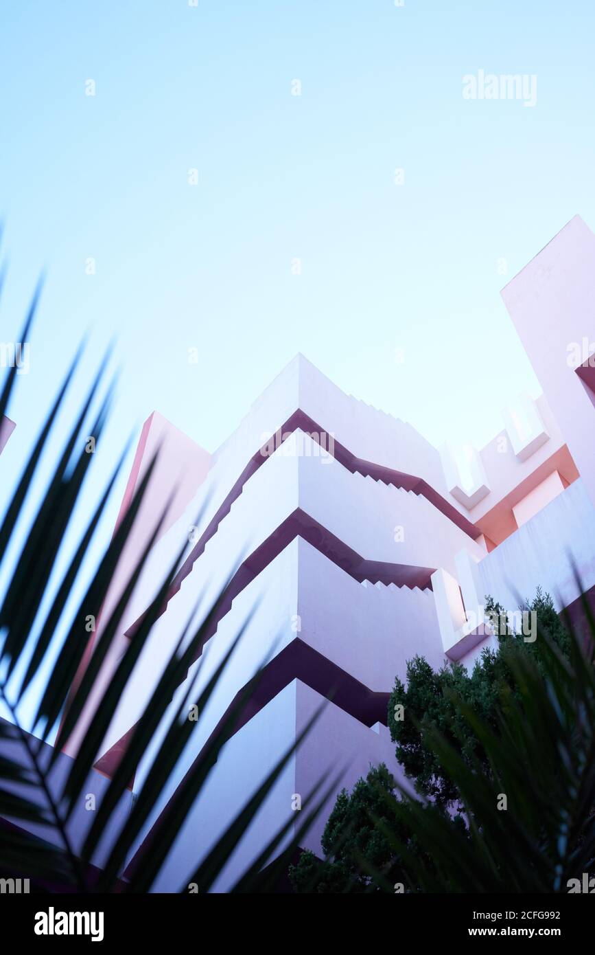 Traditional construction of bold pink color with stairs Stock Photo