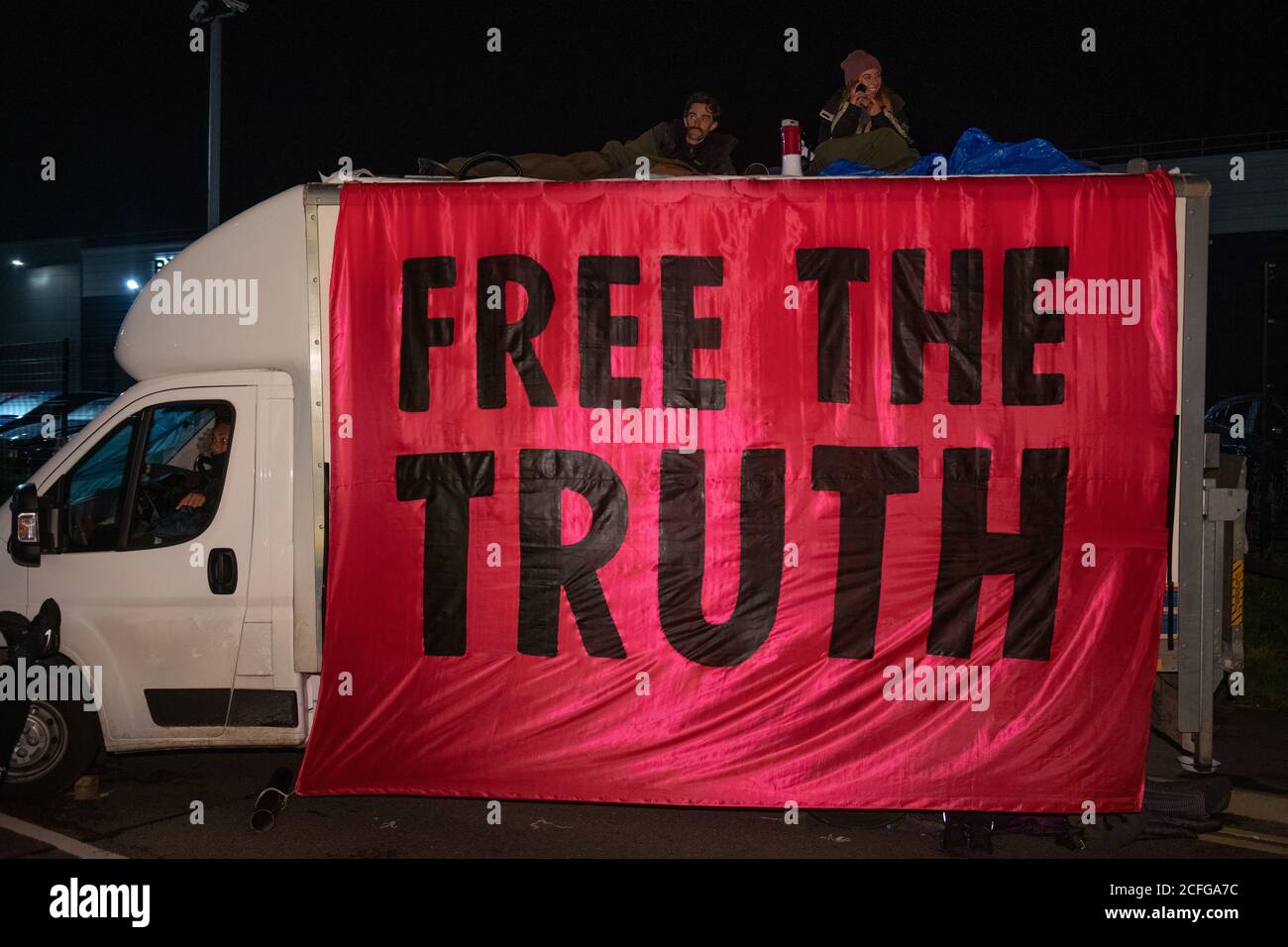 Extinction Rebellion carried out Non Violent Direct Action to blockade News International's printworks to protest ownership of UK by oligarchs and their failure to 'Tell The Truth' adequately report the scale of the Climate Crisis and their frequent support for Climate scepticism or denialism. Times, Telegraph, Sun, Mail & Evening Standard were all mostly unable to distribute print editions. Credit: Gareth Morris/Alamy Live News Stock Photo