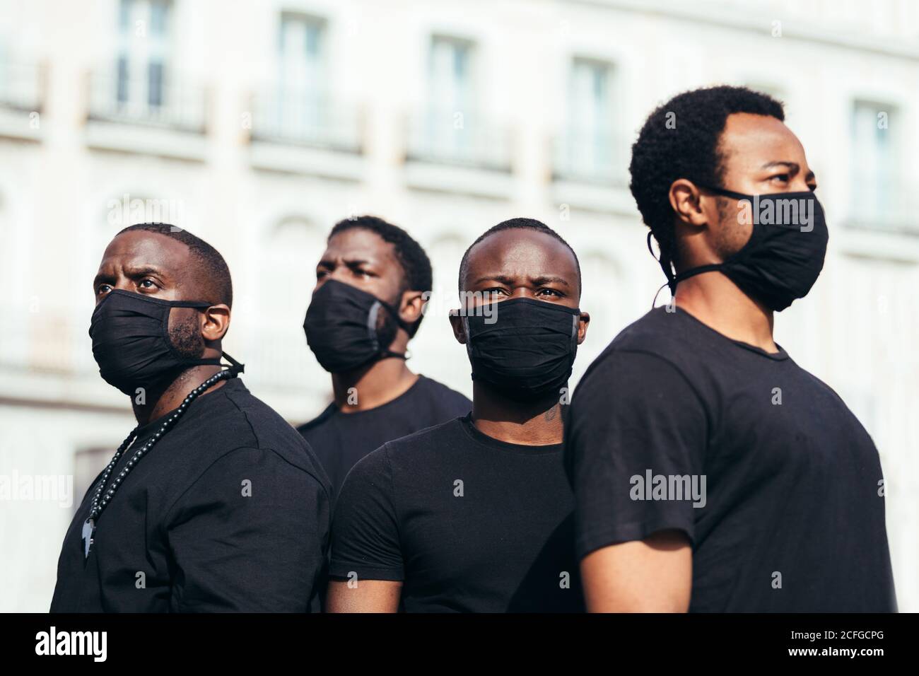 Black men wearing masks hi-res stock photography and images - Alamy