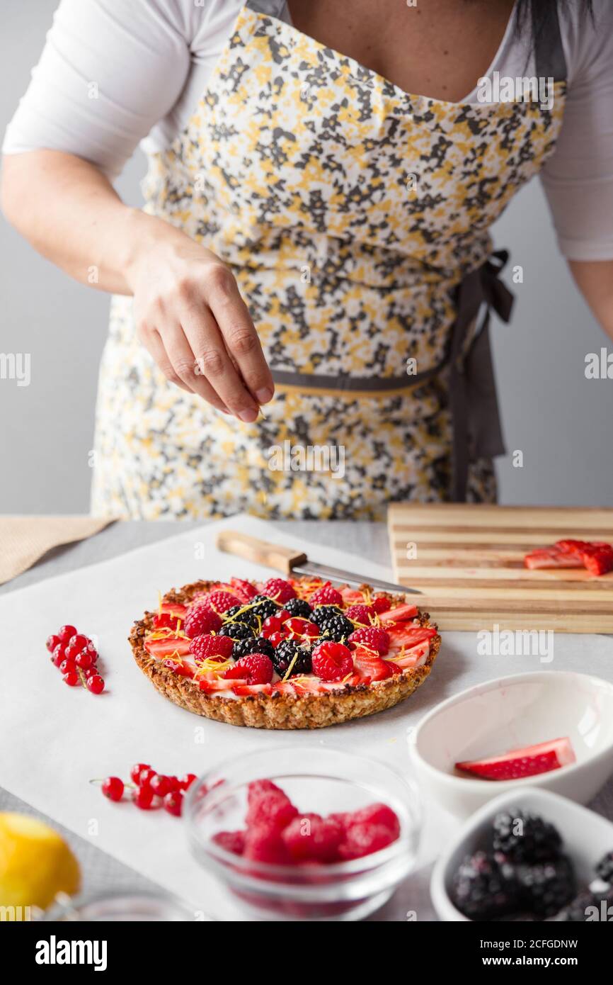 Woman preparing a cake Stock Photo