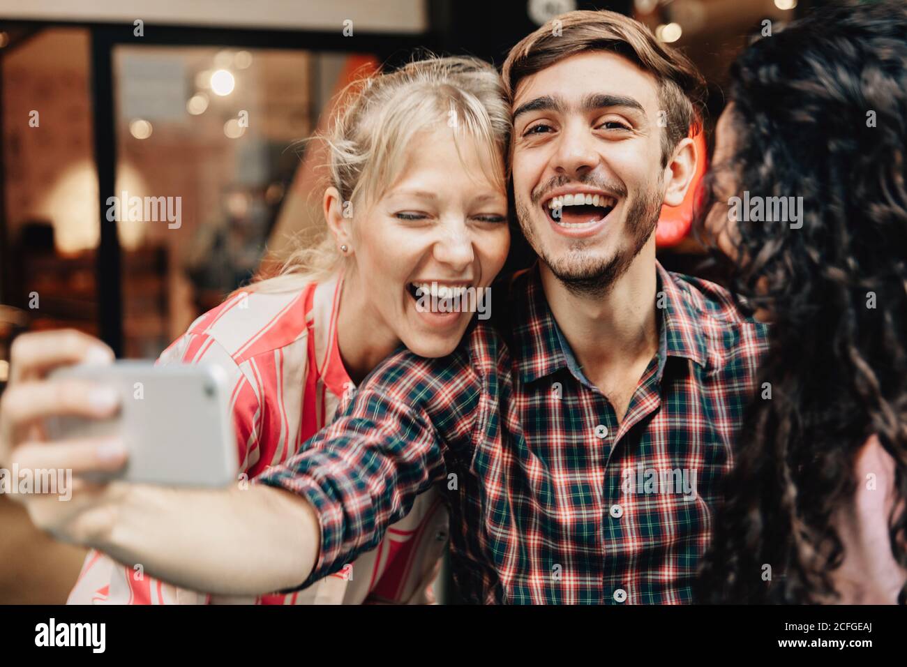 Cheerful friends taking a selfie Stock Photo