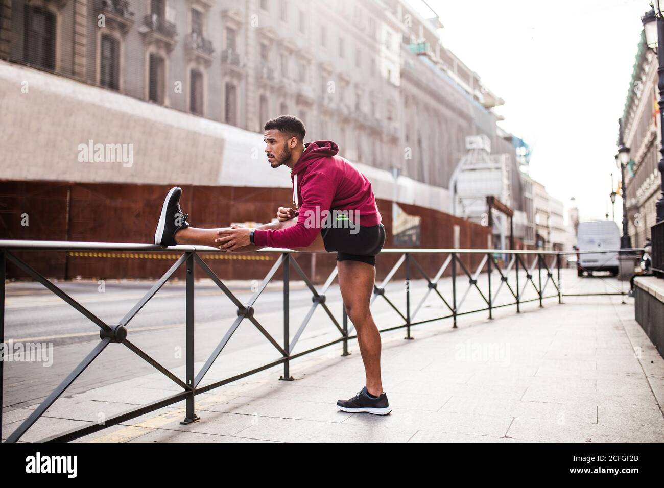 Young people stretching legs hi-res stock photography and images - Alamy