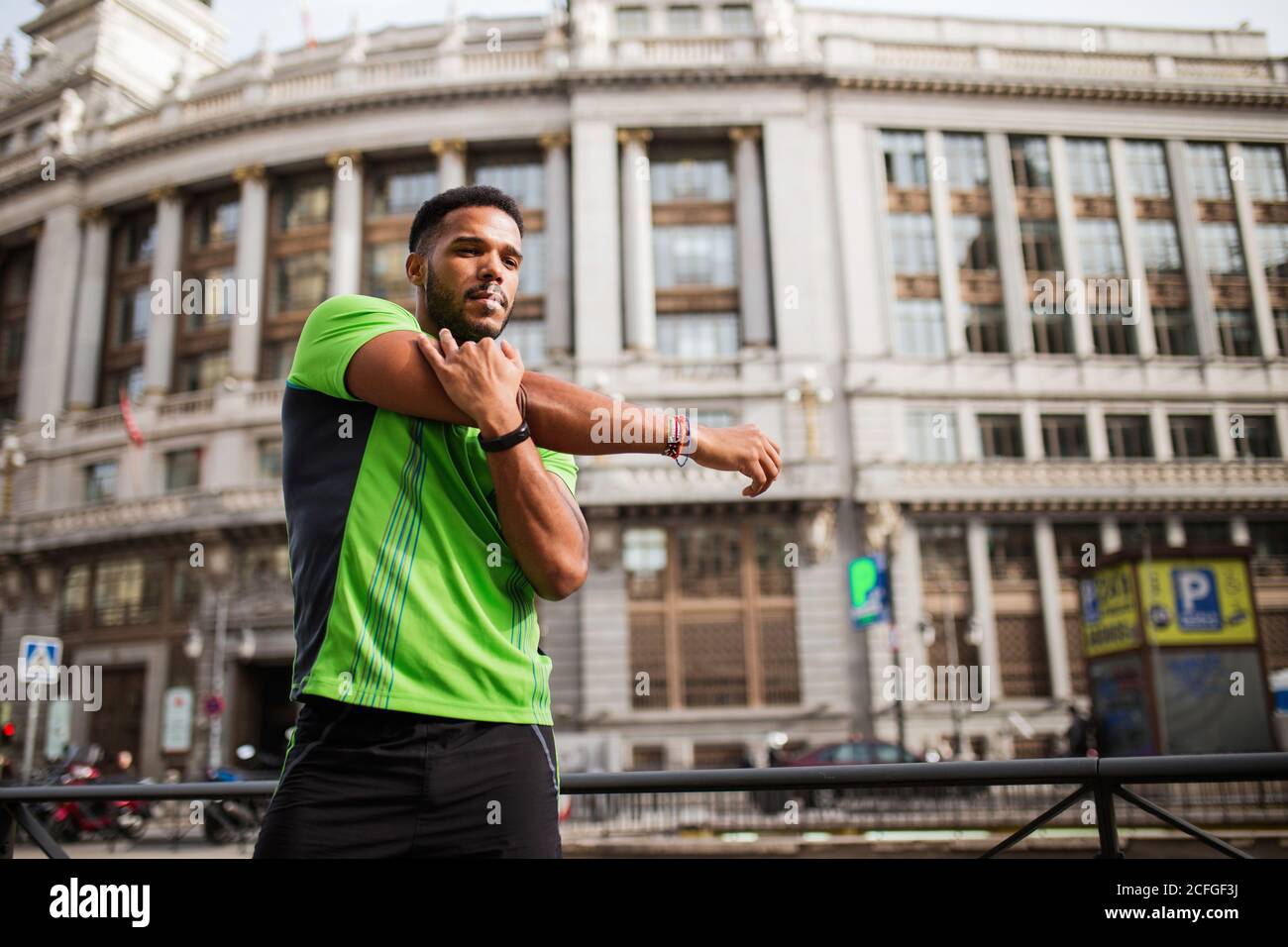 Man stretching arms hi-res stock photography and images - Alamy