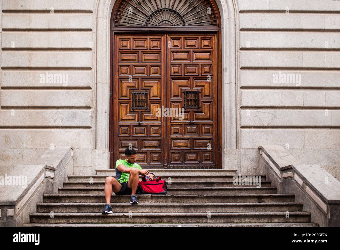 Young man sitting stairs High Resolution Stock Photography and Images ...