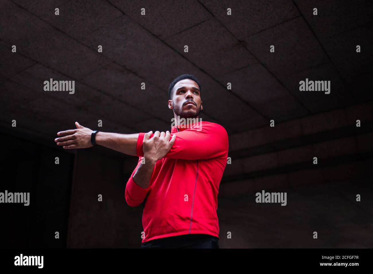 Arms fitness man stretching hi-res stock photography and images - Alamy