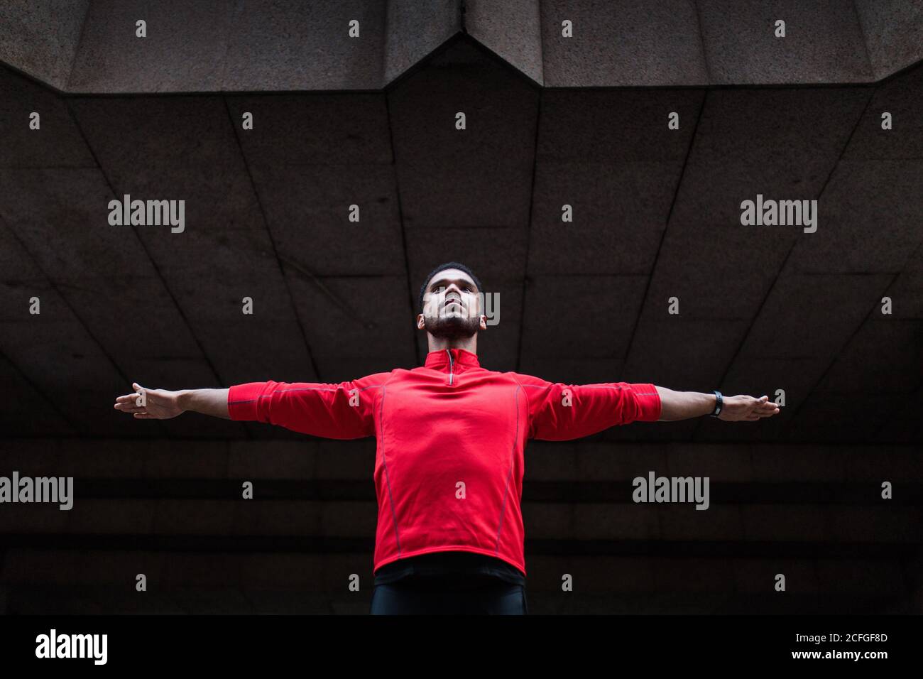 Man stretching arms hi-res stock photography and images - Alamy