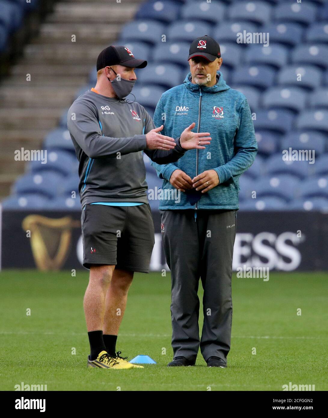 Ulster head coach Dan McFarland (right) speaks to forwards coach Roddy  Grant prior to the beginning of the Guinness PRO14 Semi-Final match at BT  Murrayfield, Edinburgh Stock Photo - Alamy