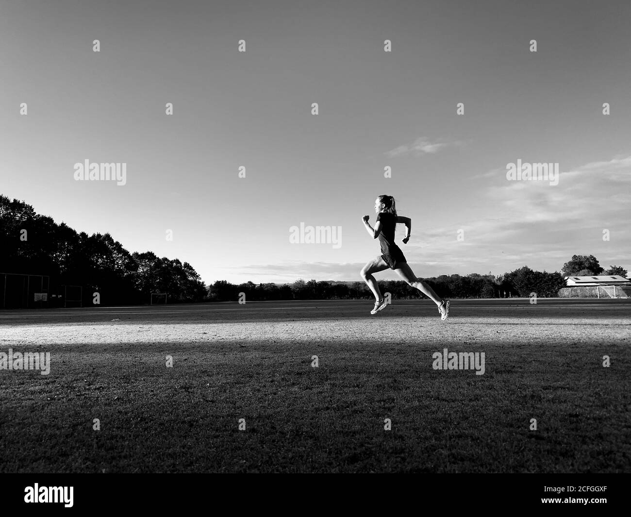 Teenage girl run training, UK. Stock Photo